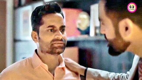 Two Indian men in intimate shoulder touch, Hindi hot web series scene from Hunters