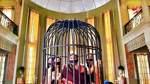 Indian women in sarees gagged and caged in BDSM scene