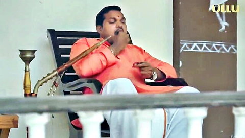 Mature Indian man smoking hookah in traditional orange kurta from Bangle Seller MILF video