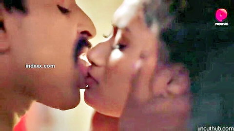 Passionate close-up kiss between Indian couple in Hindi web series