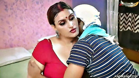 Passionate Desi Bhabhi hug in red blouse, intimate Indian couple embrace