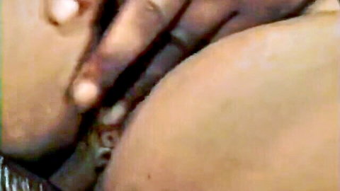 Man's hand gripping and spreading juicy pale ass cheeks closeup