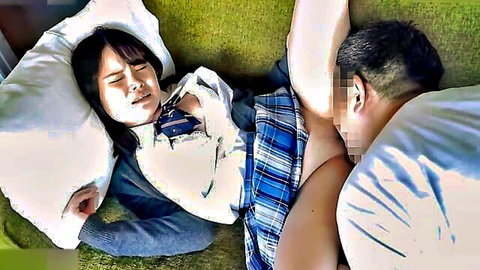 Japanese schoolgirl in uniform performs blowjob on man, black hair visible