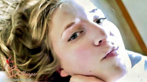 Xev Bellringer blonde MILF seductive close-up in white top