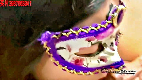 Yixuan in purple masquerade mask, teasing BDSM look