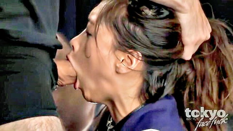 Japanese woman in ponytail facefucked roughly in BDSM scene