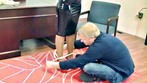 Sahrye in shiny latex skirt and heels dominated in BDSM foot worship