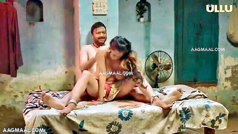 Desi Indian woman rides man's thick cock cowgirl style on rustic bed in Ullu scene