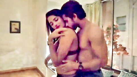 Indian MILF in black bra embraced by shirtless lover in hot erotic scene