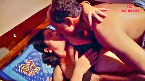 Indian MILF passionately kissing older man in bed