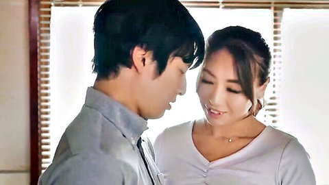 Japanese couple in intimate close-up gaze with soft lighting through shoji screens