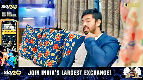 Indian man in blue suit lounging in Ullu Farebi Yaar Ep 1