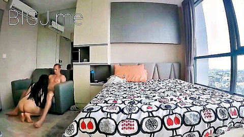 Naked Asian woman on all fours exposes wet pussy and ass crawling to suck boyfriend's cock in hotel room
