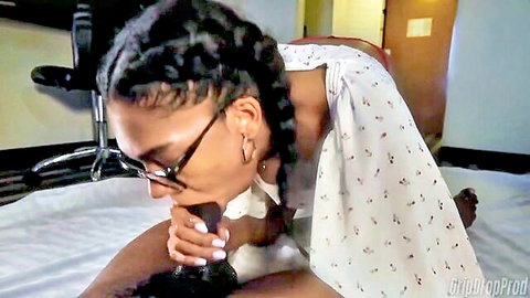 Ebony babe in glasses and braids deepthroats big cock gripping shaft with white nails