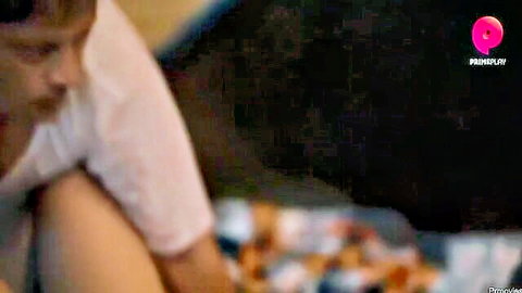 Blurry Desi woman in white top sitting on bed in Pehredaar S3e4