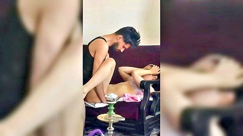Amateur Middle Eastern couple in lingerie, man performing oral on blindfolded girlfriend