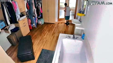 Stepbrother spies on horny stepsister from closet in bathroom