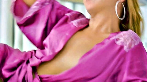 Apolonia Lapiedra in seductive pink silk robe, teasing deep cleavage