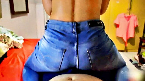 Curvy woman dry humping in tight blue jeans from behind