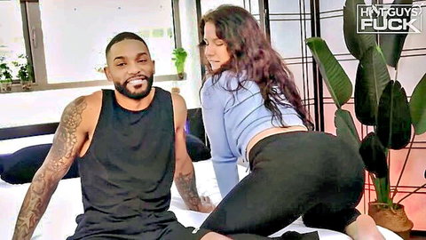Busty MILF teases muscular black guy from behind on bed