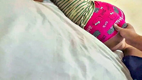 Stepdaughter spanks stepdad in pink Hello Kitty shorts, exposed ass on bed