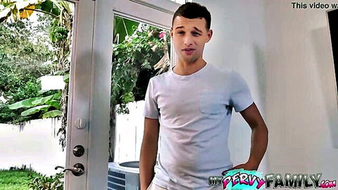 Young guy in white tee stands at patio door in pervy family taboo video
