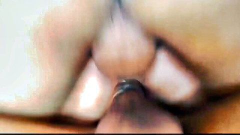 Close-up of tight pink shaved pussy stretched by thick dark cock penetration