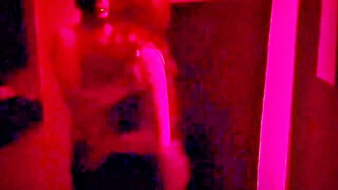 Blurry red-lit thumbnail of topless ebony woman in intimate private fuck scene
