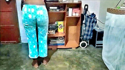 Vietnamese amateur cleaning girl in printed pajamas, back view