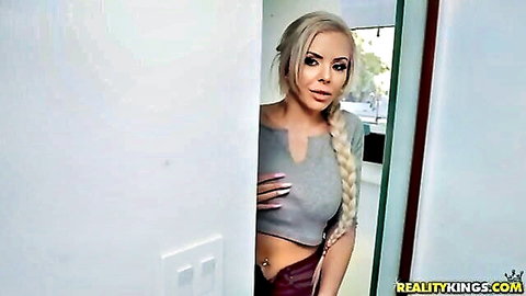 Blonde Nina Elle teasing in crop top and skirt mirror pose