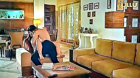 South Asian MILF rides big cock reverse cowgirl on sofa with huge tits exposed