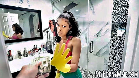 Maya Farrell as sexy Latina maid in gloves, confronting with cash offer