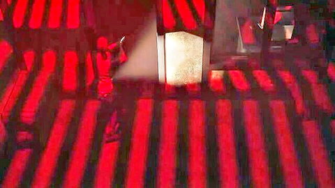3D CGI brunette couple in red striped fantasy room with big tits tease