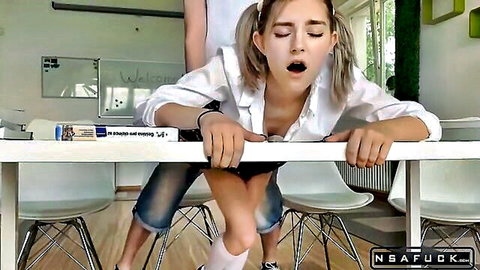 Blonde teen student bent over classroom desk getting fucked doggy style with tits exposed