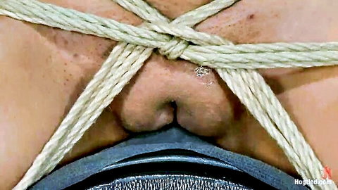 Close-up bound wet vulva in BDSM rope bondage from Super Soaked Squirting Snatch
