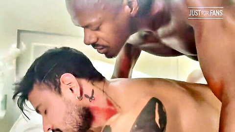 Muscular black guy fucking tattooed bearded dude doggy style in bathroom