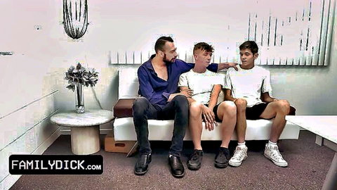 Muscular DILF stepdad sits with two young stepsons on couch in gay taboo threesome preview