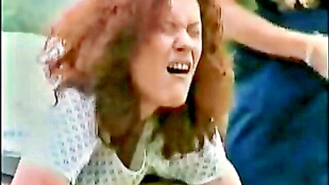 Redhead lesbian spanked in clinic by another woman