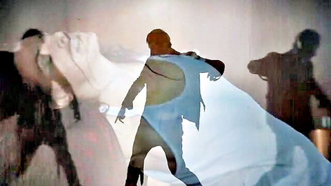 Shadowy sensual dance in Dan Balan Chica Bomb video, artistic figures in motion