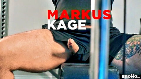 Muscular bear Markus Kage in tight black gym shorts tease