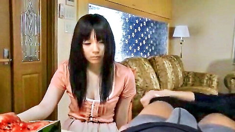 Maki Hojo in pink dress holding watermelon for POV blowjob JAV scene