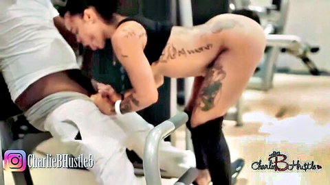 Charlie Bhustle ebony babe fucked doggystyle by maintenance man in gym