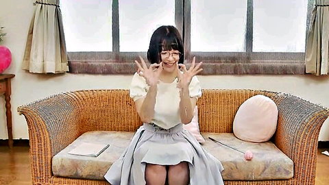 Nenne Ui cute Japanese JAV model in off-shoulder top and skirt, glasses, smiling solo