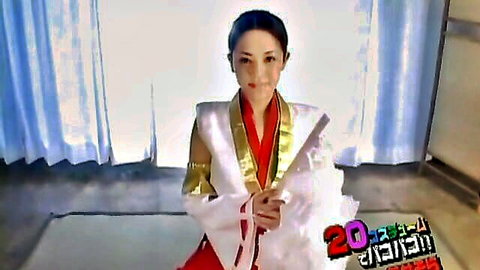 Sora Aoi in sexy white kimono, smiling JAV tease