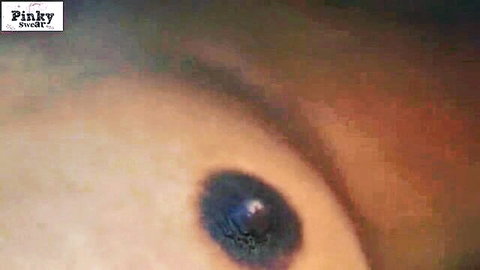 Close-up of dark nipple and areola on woman's breast in desi porn teaser