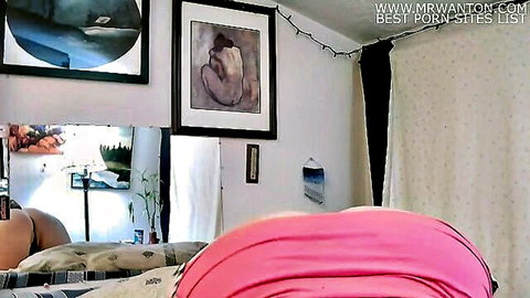 Amateur solo babe in pink shorts showing curvy ass from behind