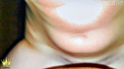 Blurry close-up of pale woman's neck and chin skin folds with heavy iwantonsites watermarks