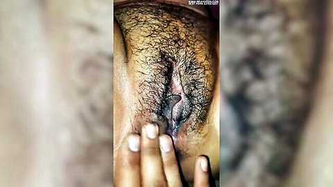 Hairy Desi pussy close-up with hand spreading labia, amateur solo