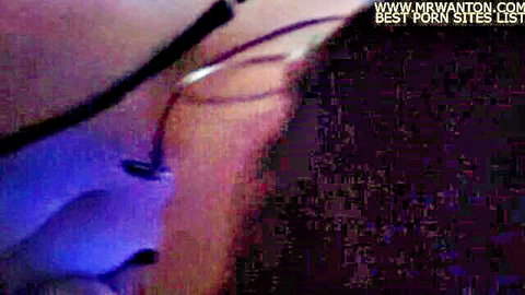 Luna in glasses, seductive close-up neck and face in purple light