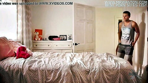 Athletic man in tank top peeking into pink bedroom in MissaX Mother's Test Pt. 2